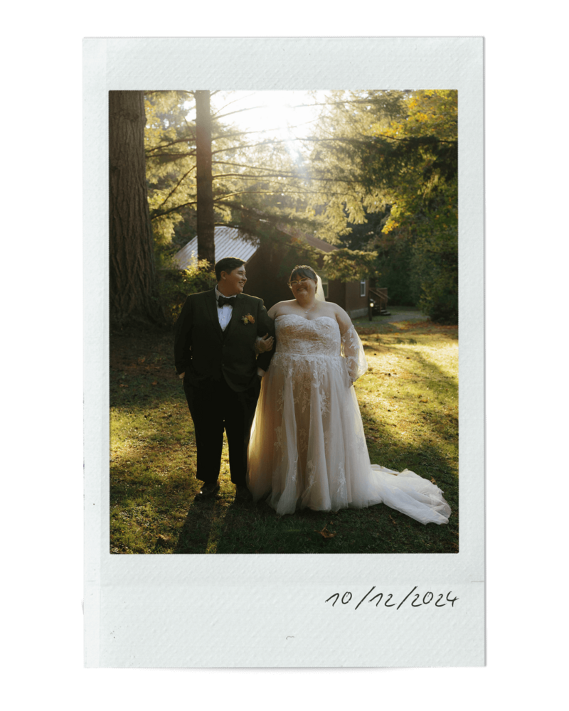 Brides standing outdoors at their wedding reception, representing a wedding in the event planning portfolio of Birdie June Events and Rentals.