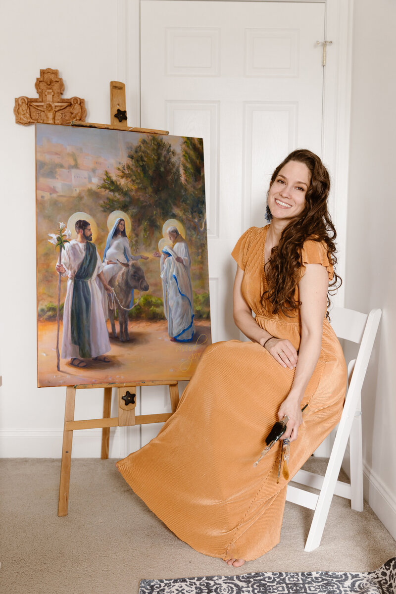 woman smiling with art