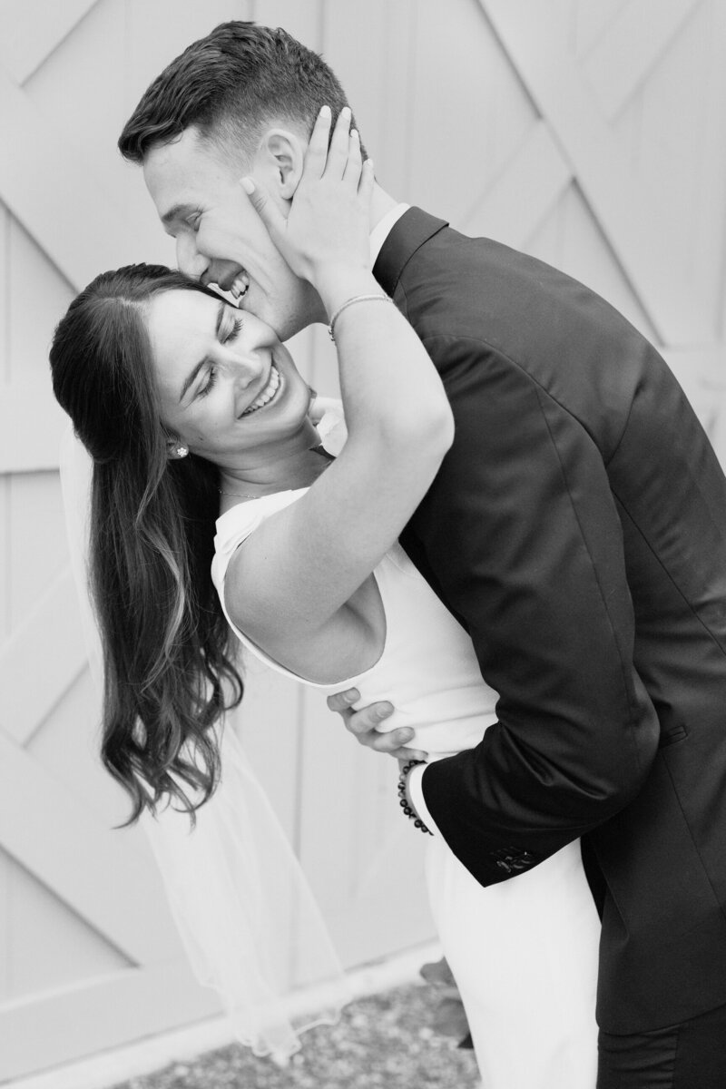 couple embracing smiling together