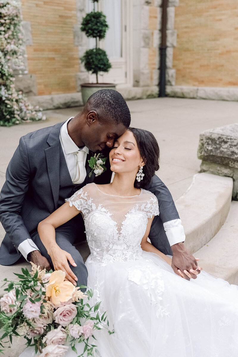 bride and groom embracing