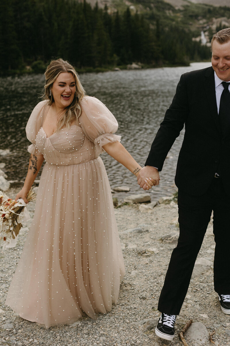A couple at Blue Lakes Colorado right after their wedding