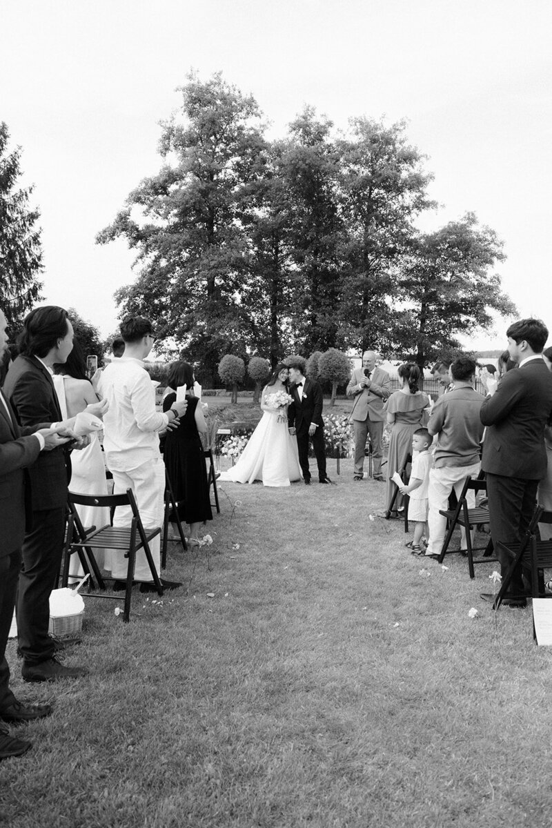 Luxury wedding in Europe – sophisticated bride in a modern wedding gown and groom in a timeless suit.