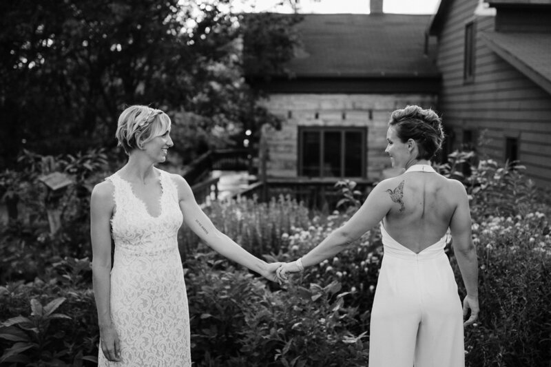 A professional women's soccer player and her partner on their wedding day