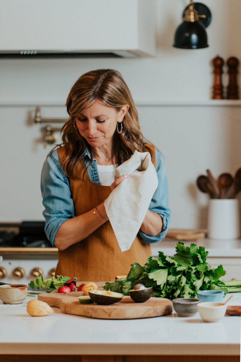 Sam cooking in her kitchen