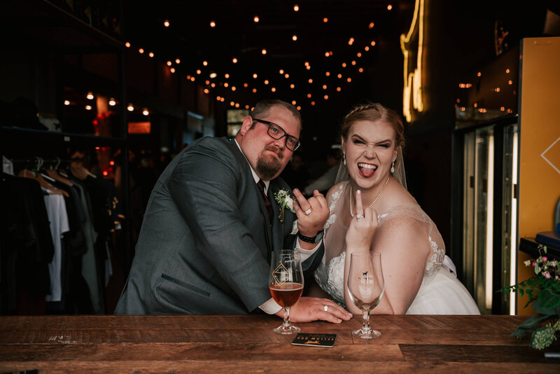 bride and groom at a brewery