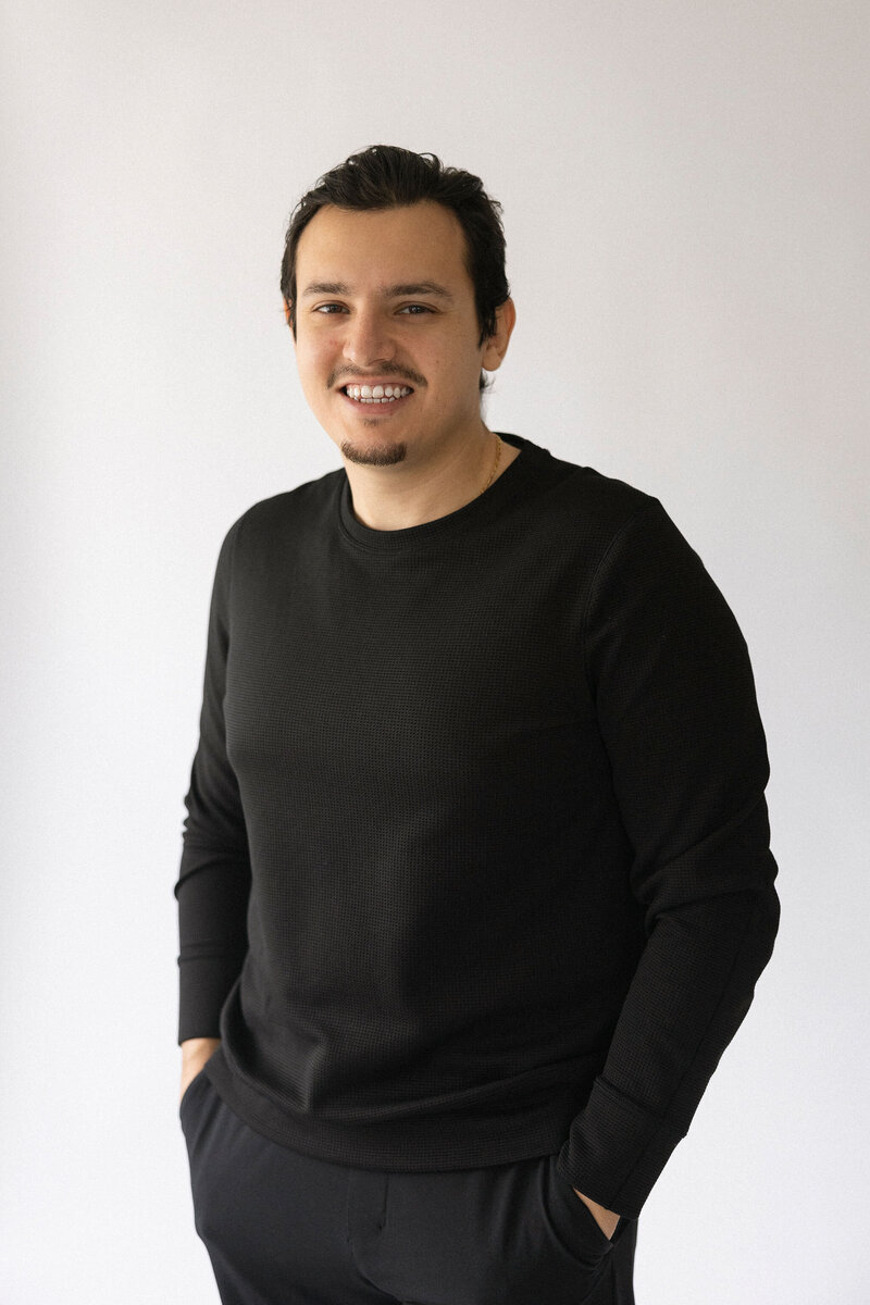 Coach Juan, a NASM-certified personal trainer and former U.S. Marine, specializing in personalized EMS fitness programs.