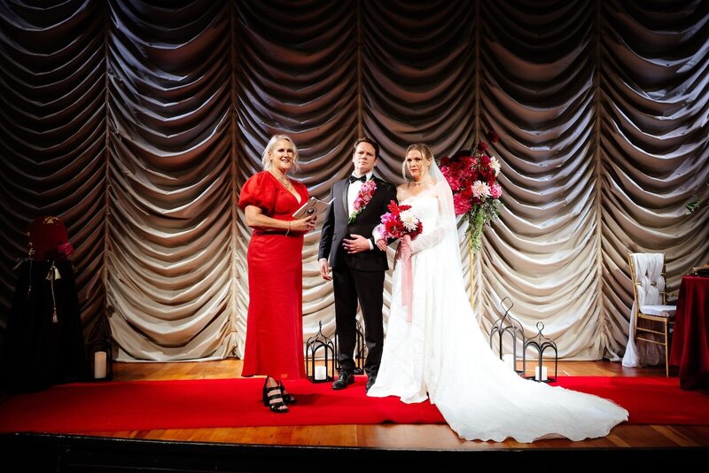 Modern wedding ceremony in art deco cinema venue Auckland