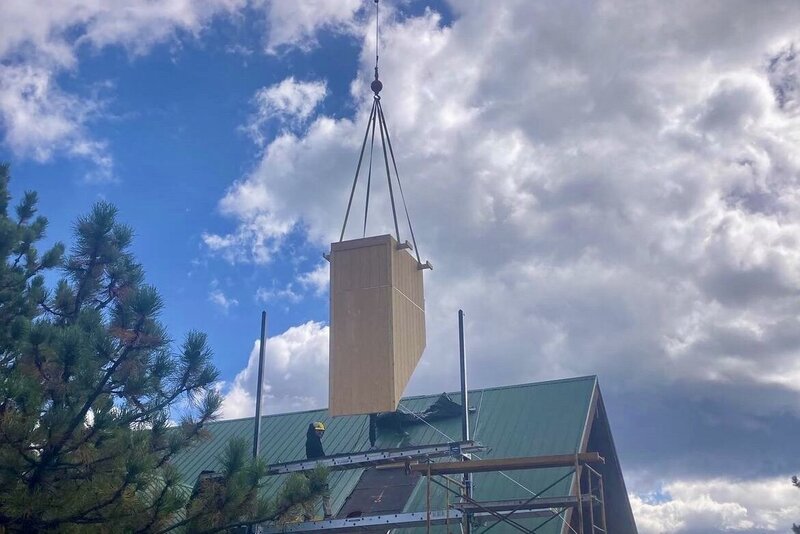 Chimney and roof installation by Mountainside Crane Service in Denver Metro and Foothills