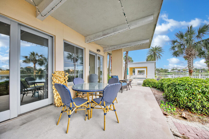 patio with round dining table and chairs