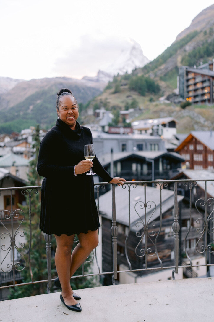 A woman standing and admiring the landscape of stark winter landscape of southern Argentina