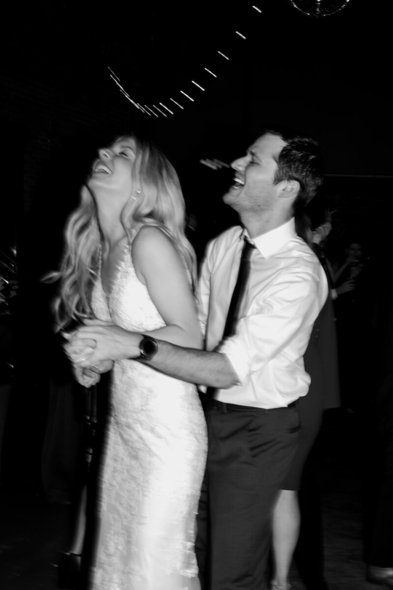 Bride and groom dance at their wedding