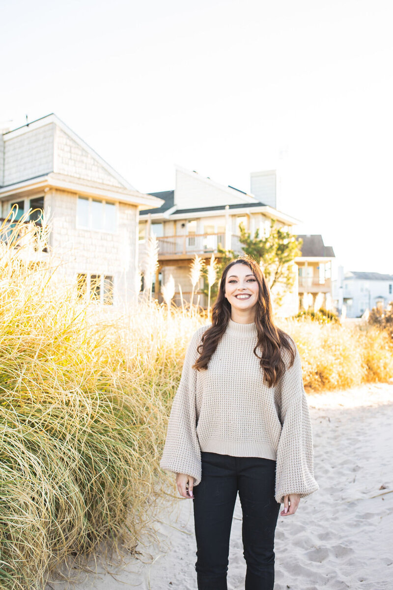 Therapist standing on the beach