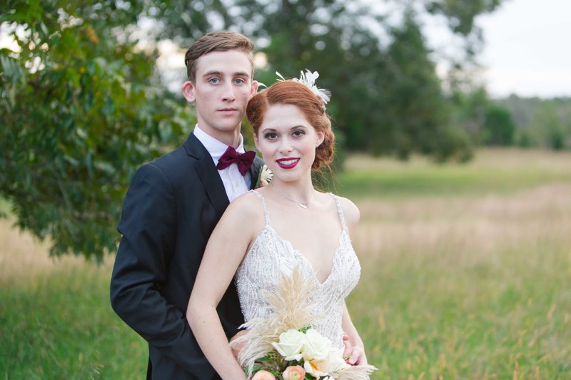 Great gatsby inspired wedding couple in a field at parterre