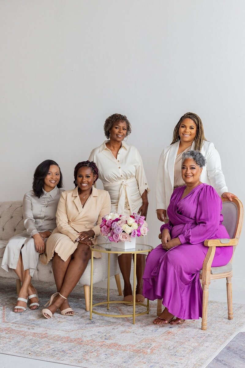 Team of female wedding pros part of TAG Mastermind Community for scaling wedding business