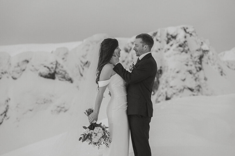 Bride and groom wedding portraits during their helicopter elopement next to the Comox Glacier by Latitude 49 Photography.