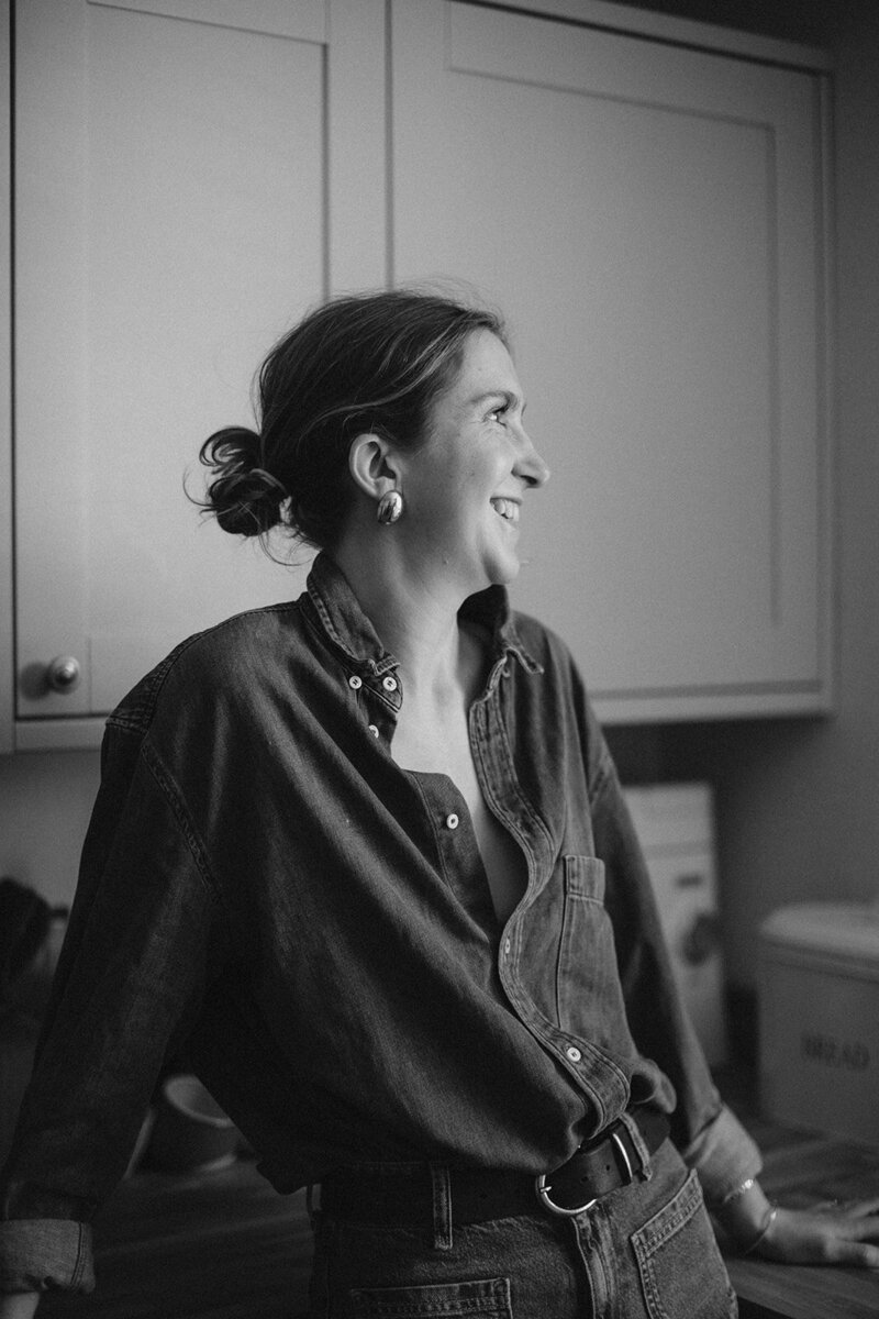 business coach and copywriter smiling in her Oxfordshire kitchen 