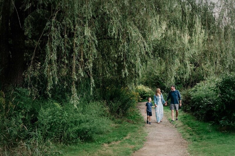 Family walking through a park