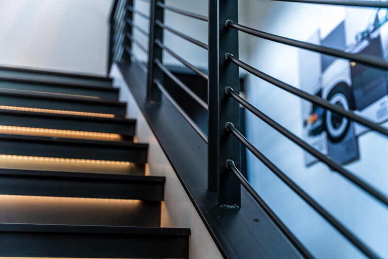 modern-home-steel-stair-railing-step-lights-detail
