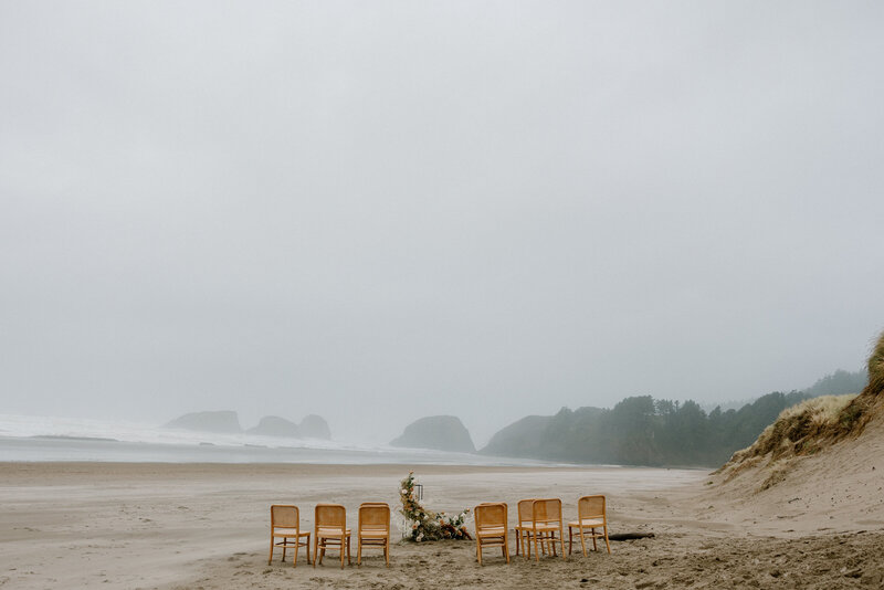Detail shot of a stormy micro wedding ceremony on Cannon Beach.