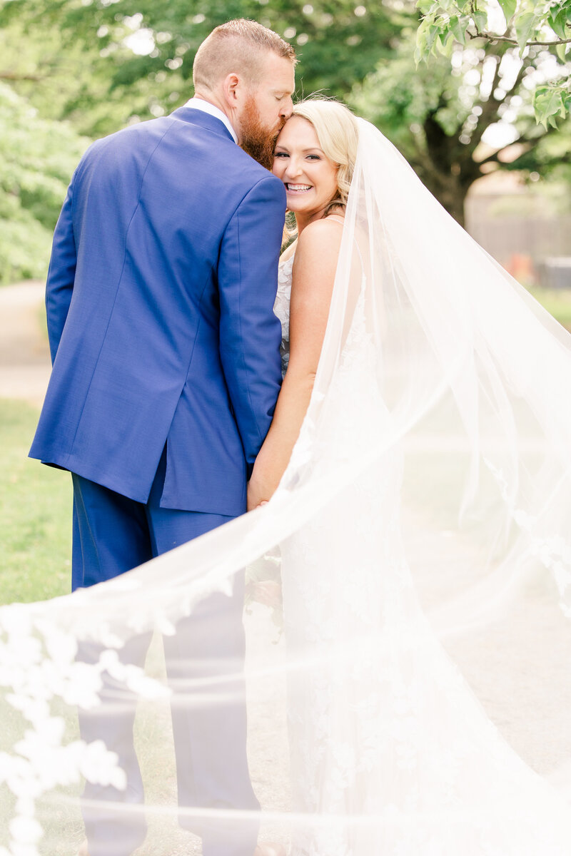 Bride and groom walk up memorial steps at their DC wedding