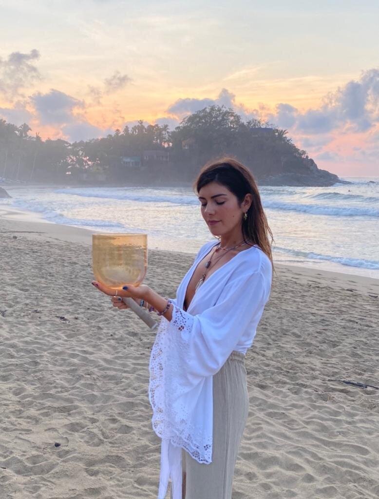 Leah Cavazzini, a certified sound healer specializing in crystal bowl therapy and holistic vocal sound healing, guiding transformative sessions for energetic balance and emotional release.