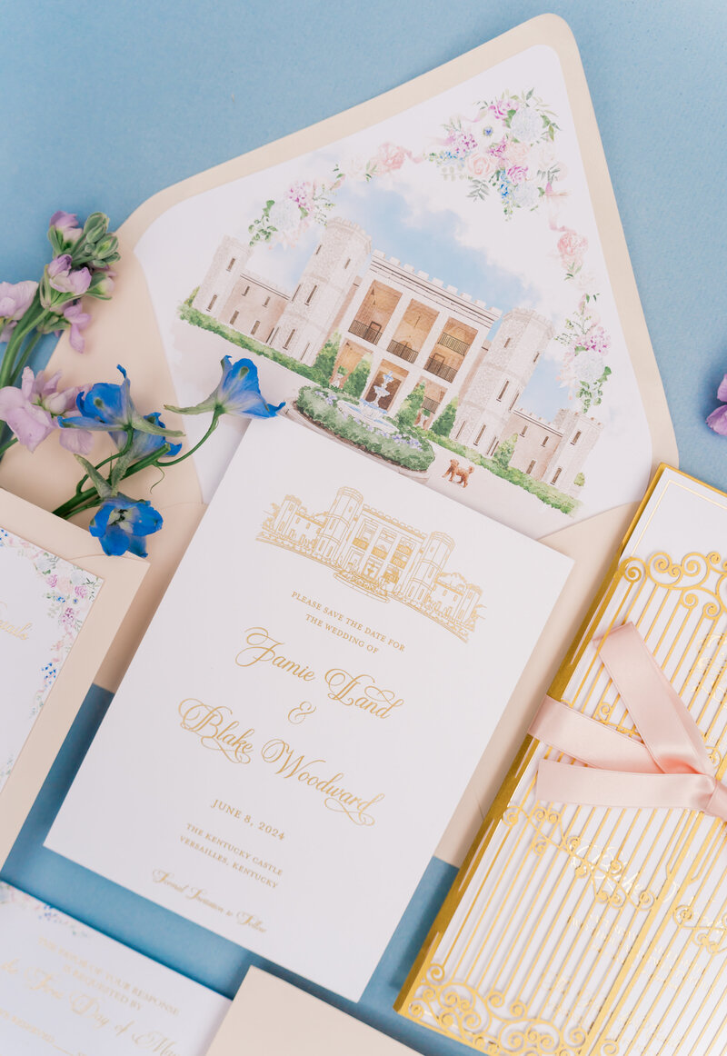 gorgeous neutral wedding invitations with watercolor envelope liner and venue illustration