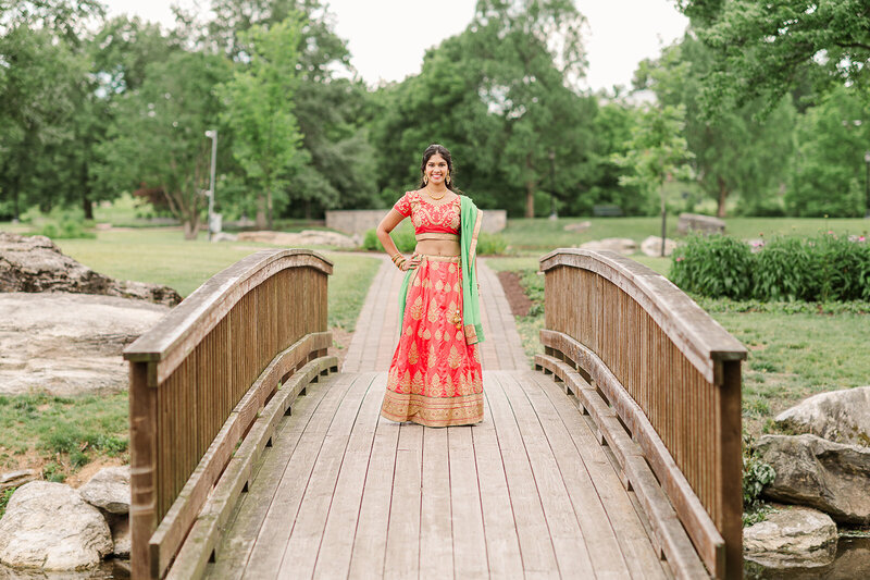 Senior girl, standing in the middle of a bridge at founders Hall in Hershey PA by Lancaster photographer