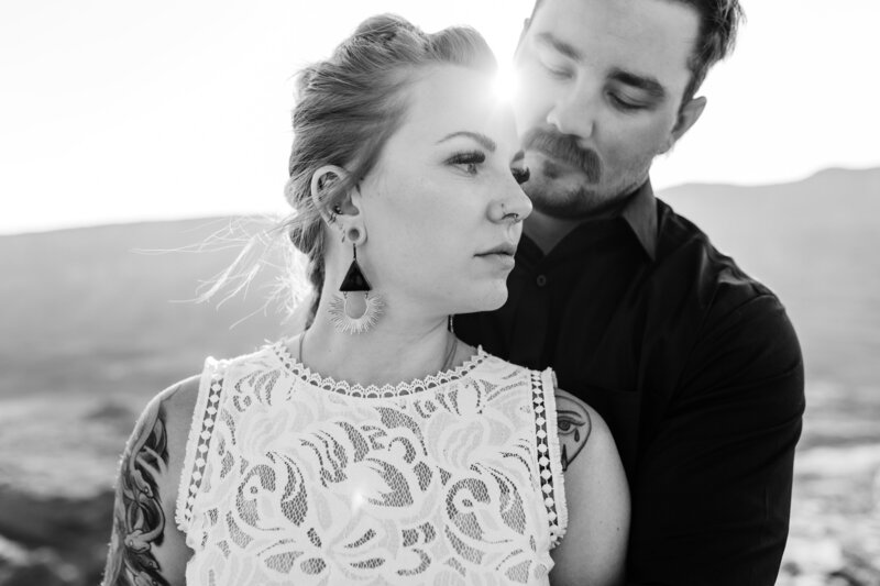 close up of married couple with wife looking off into the distance Oregon Coast Elopement and Wedding Photographer