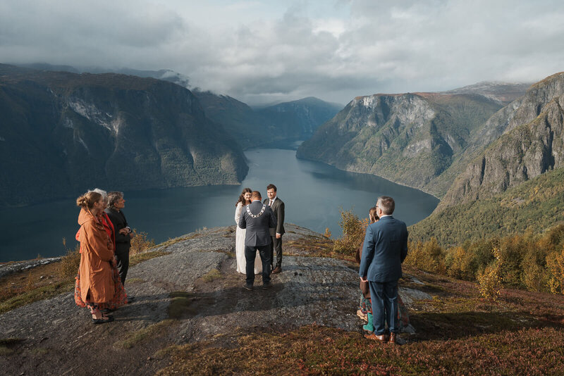 Elopement couple getting married on a mountain by the fjords in aurland norway