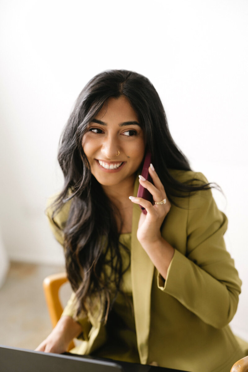 The Social Heirloom Phone Smiling Branding Photo in Denver Colorado