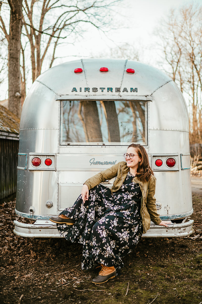 boston family photographer sits on airstream bumper