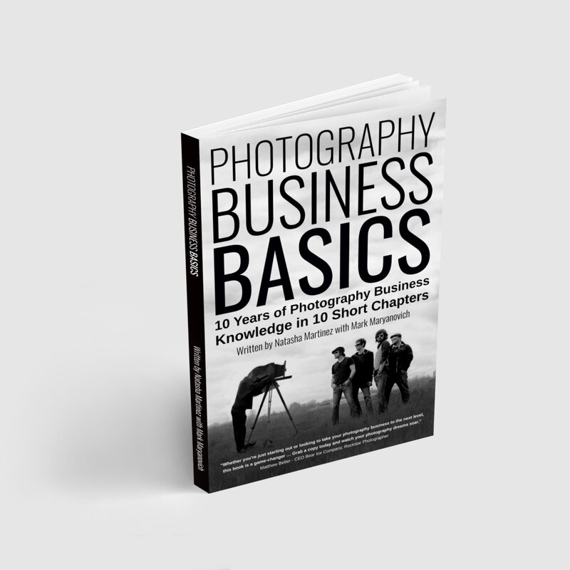 Photography Business Basics book paperback displayed standing up partially opened in black and white