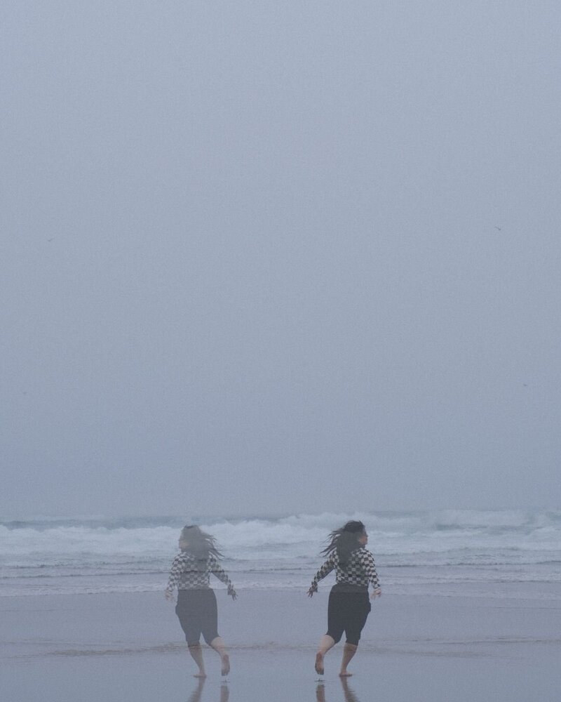 double exposure image of inclusive photographer mariah milan running on cannon beach in oregon