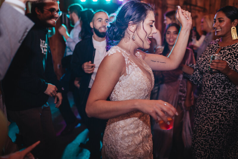 bride dancing to her favorite song at her wedding reception
