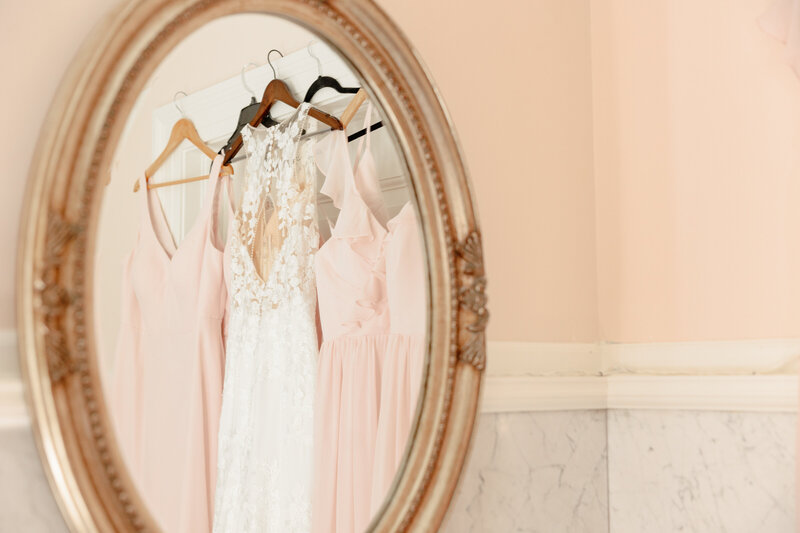 just before getting ready, Liriodendron Wedding photographer snaps a photo of the dresses hanging in the bridal suite.