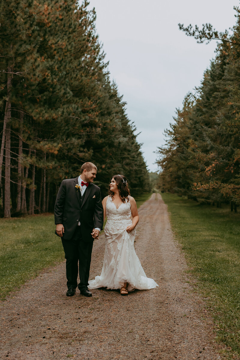 bride-and-groom-on-wood-path