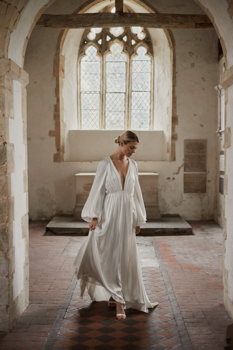 Drawstring silk wedding dress, modern elegant bridal gown style on bride in church