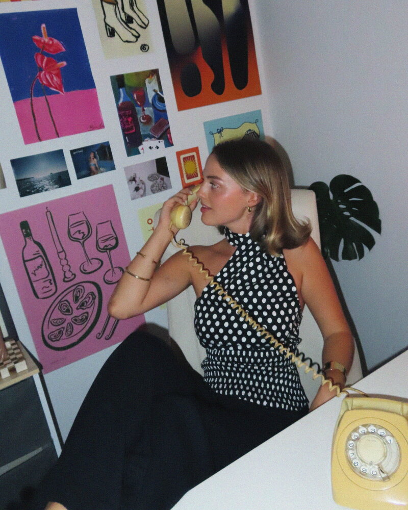 Hannah in the office on the phone.