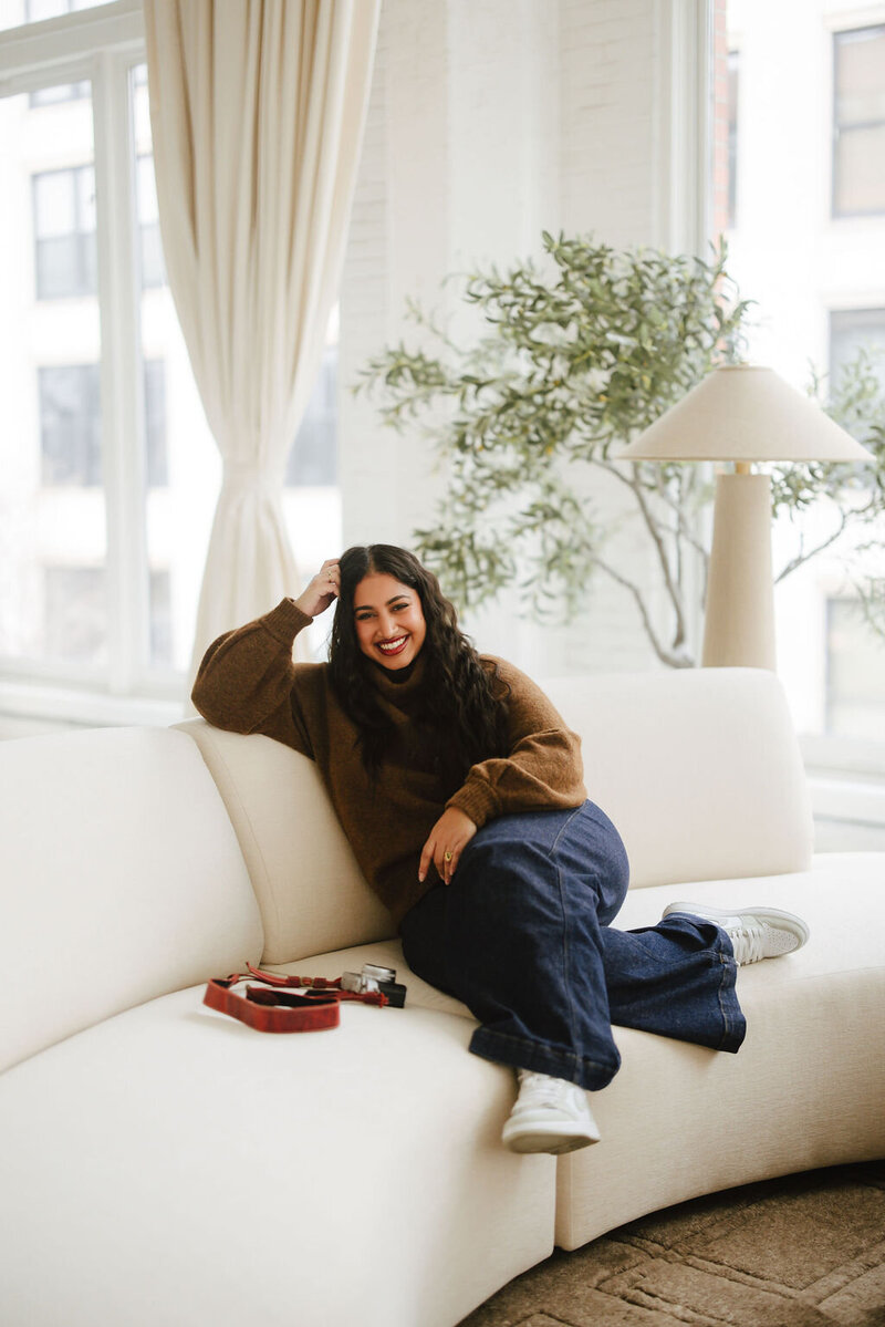 Female sitting in a studio rental space in Chicago.