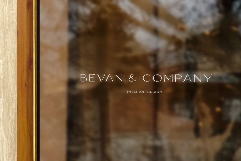 Glass window with Bevan & Company Interior Design logo