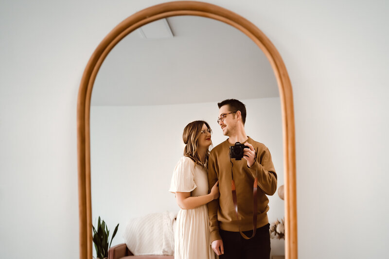 couple smile mirror love