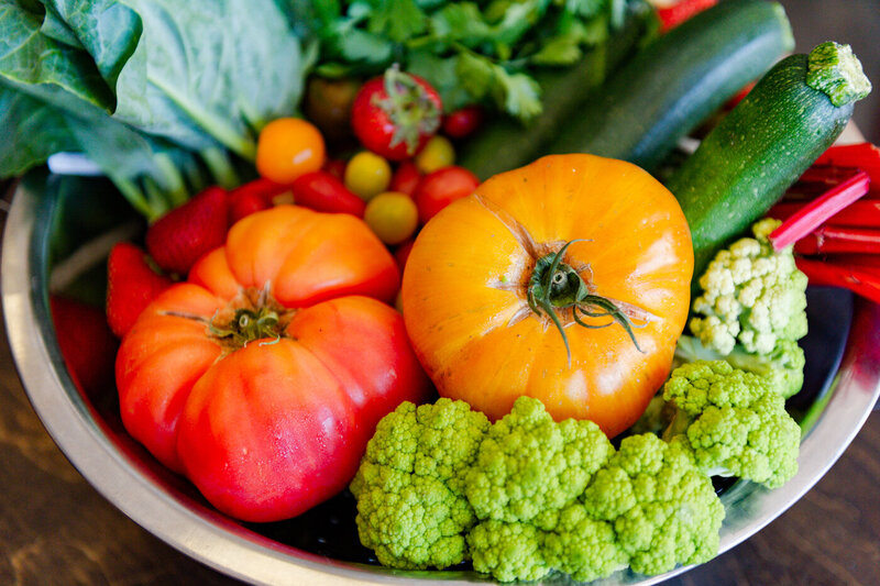 Food photography of a bowl of fresh raw vegetables for personal chef Jenny Ross branding session.