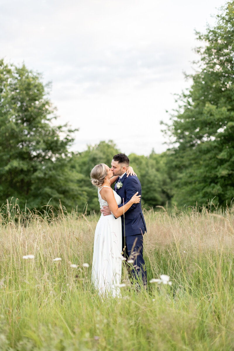 Bride and Groom in field