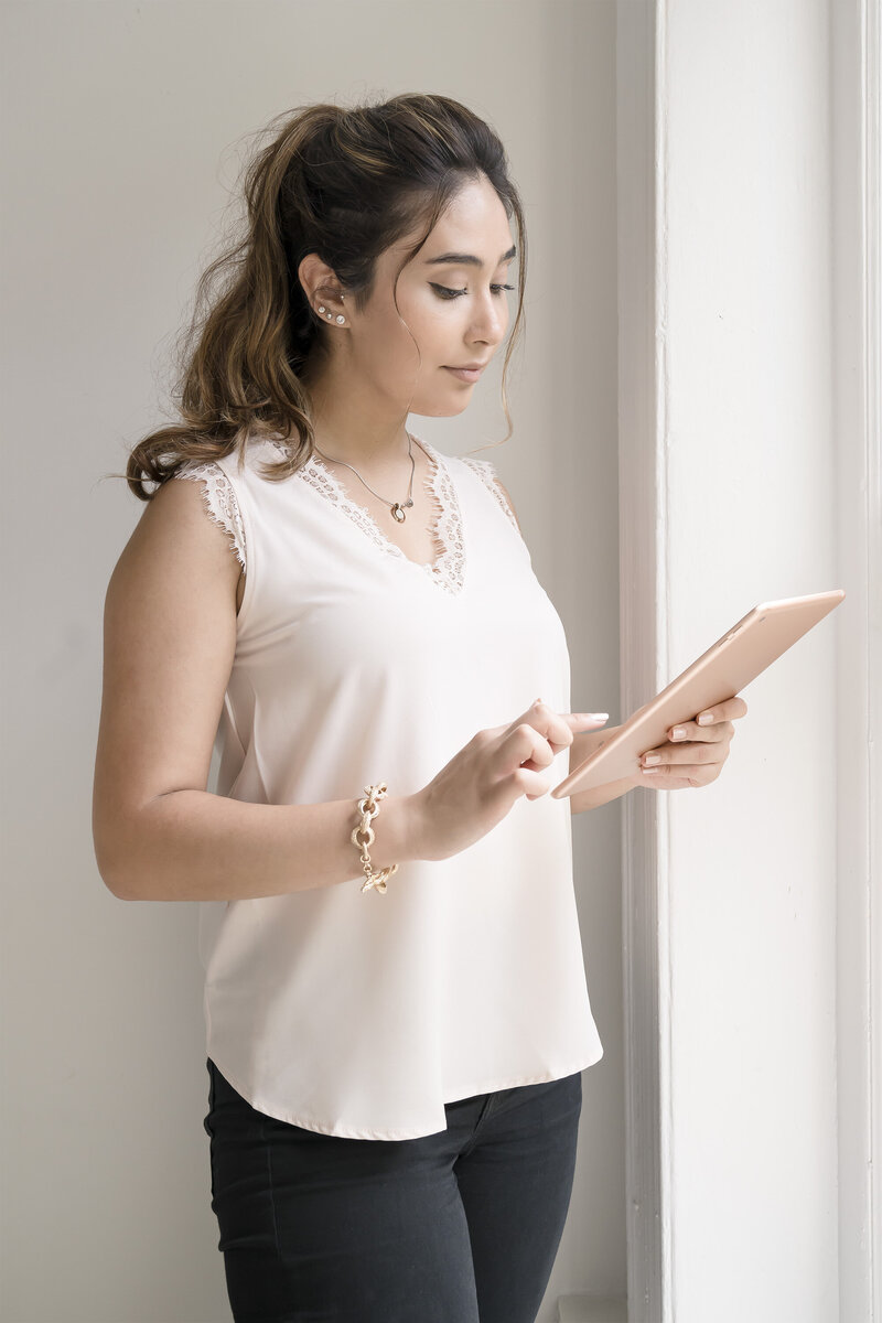 woman using ipad