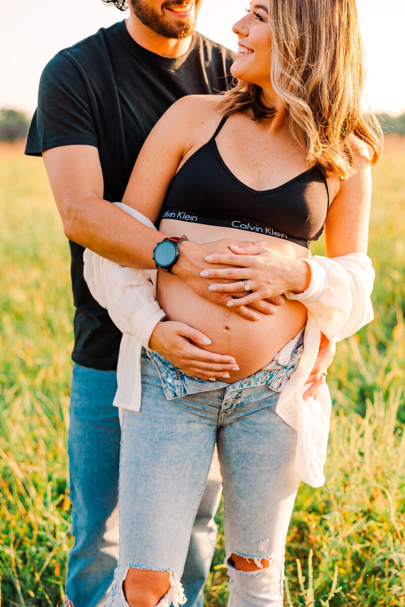 Maternity portraits in Harrisonburg, VA, capturing the anticipation of parenthood in a peaceful outdoor setting