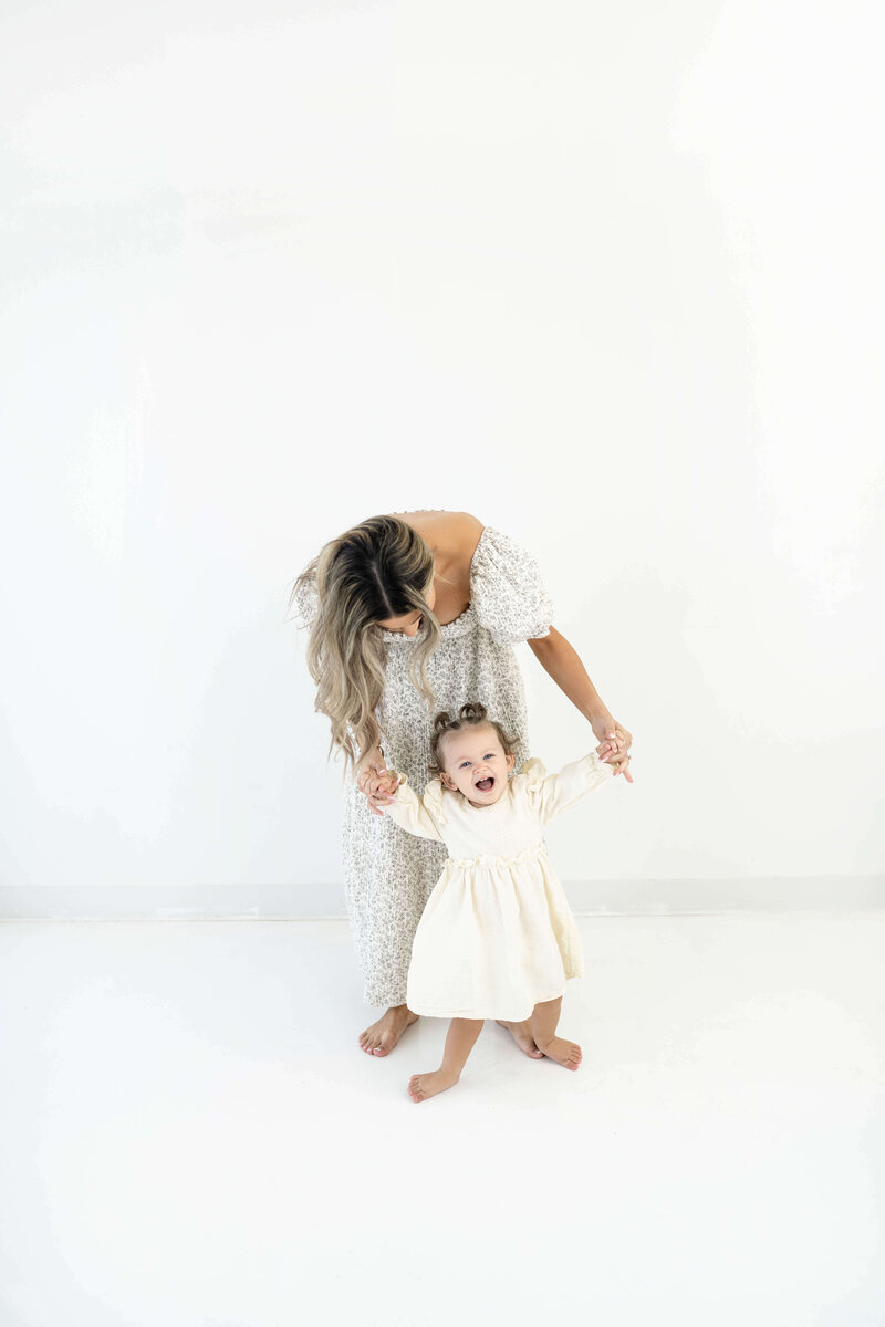 OKC MOM SNUGGLING HER TODDLER IN OKLAHOMA CITY FAMILY PHOTOGRAPHY STUDIO