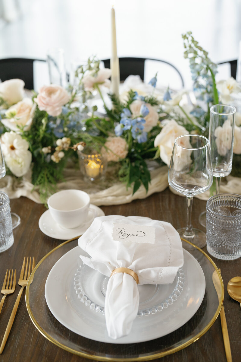 Wedding reception tables captured by Bramble and Vine Photography in Emmett, Idaho, complete with tabletop decor by Gifting Idaho and florals by Wild Alpine Floral