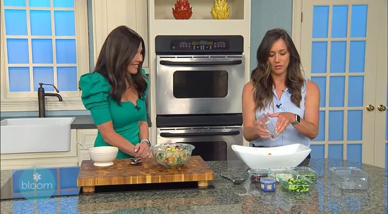 Woman chopping vegetables making a salad