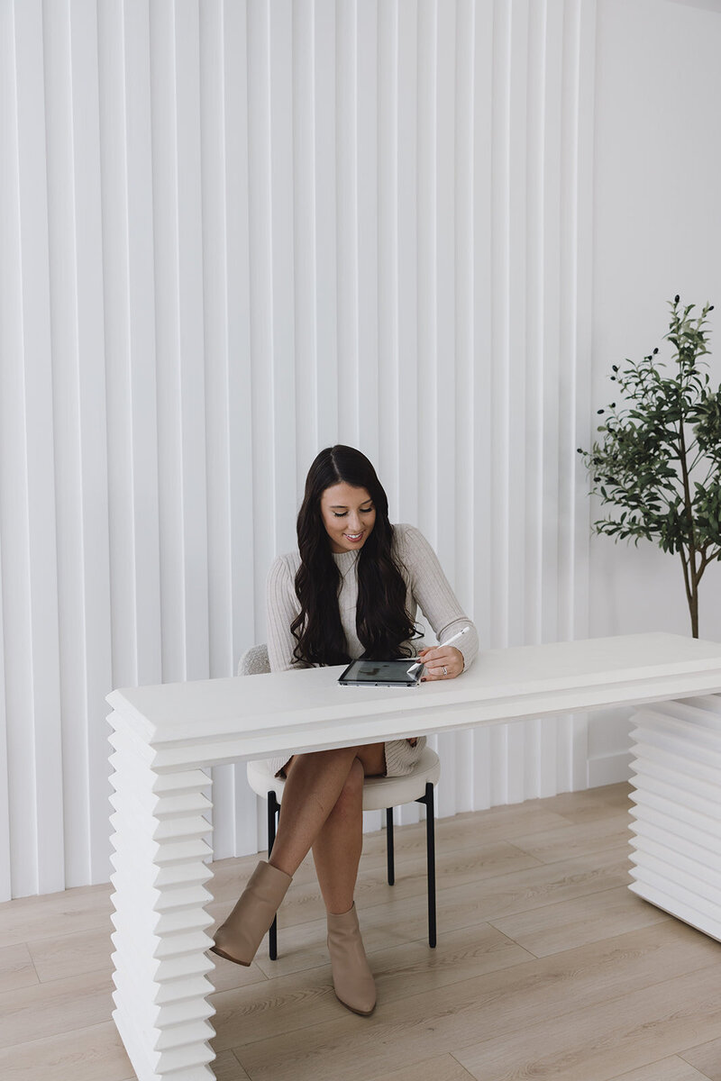 Danielle writing on ipad 