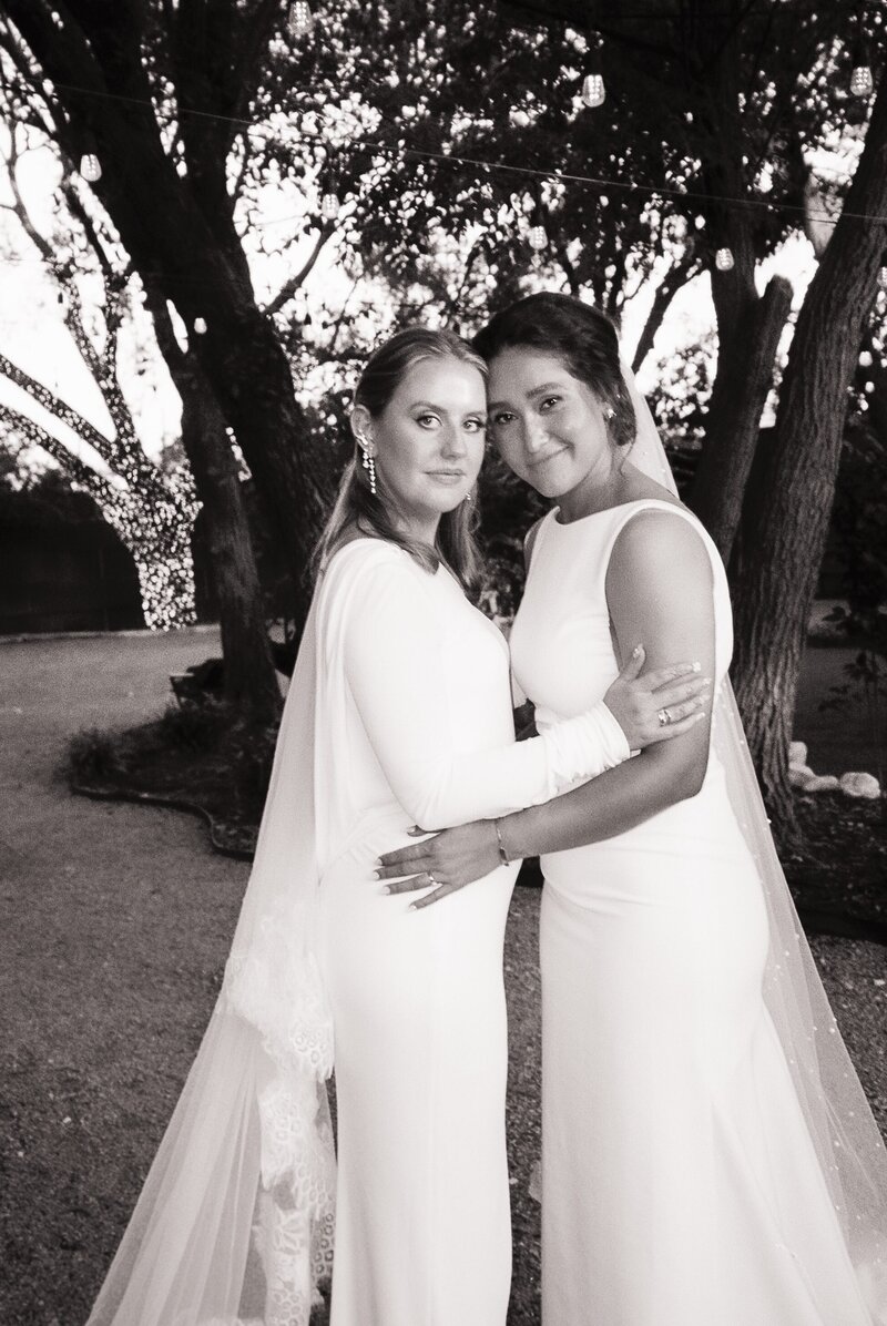 brides hugging each other